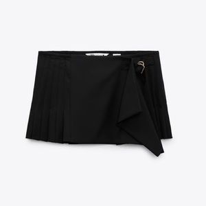 PLEATED SHORT SKIRT LIMITED EDITION